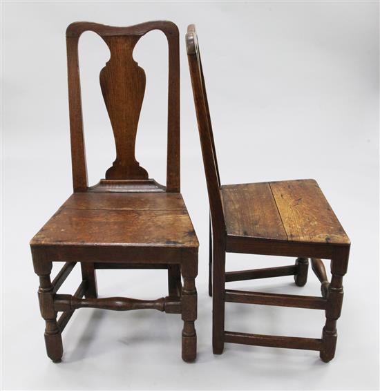 A pair of 18th century oak hall chairs,